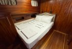 Comfortable double bed in private cabin